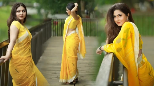 হলুদ শাড়িতে ভক্তদের মনে ঝড় তুললেন স্পর্শিয়া